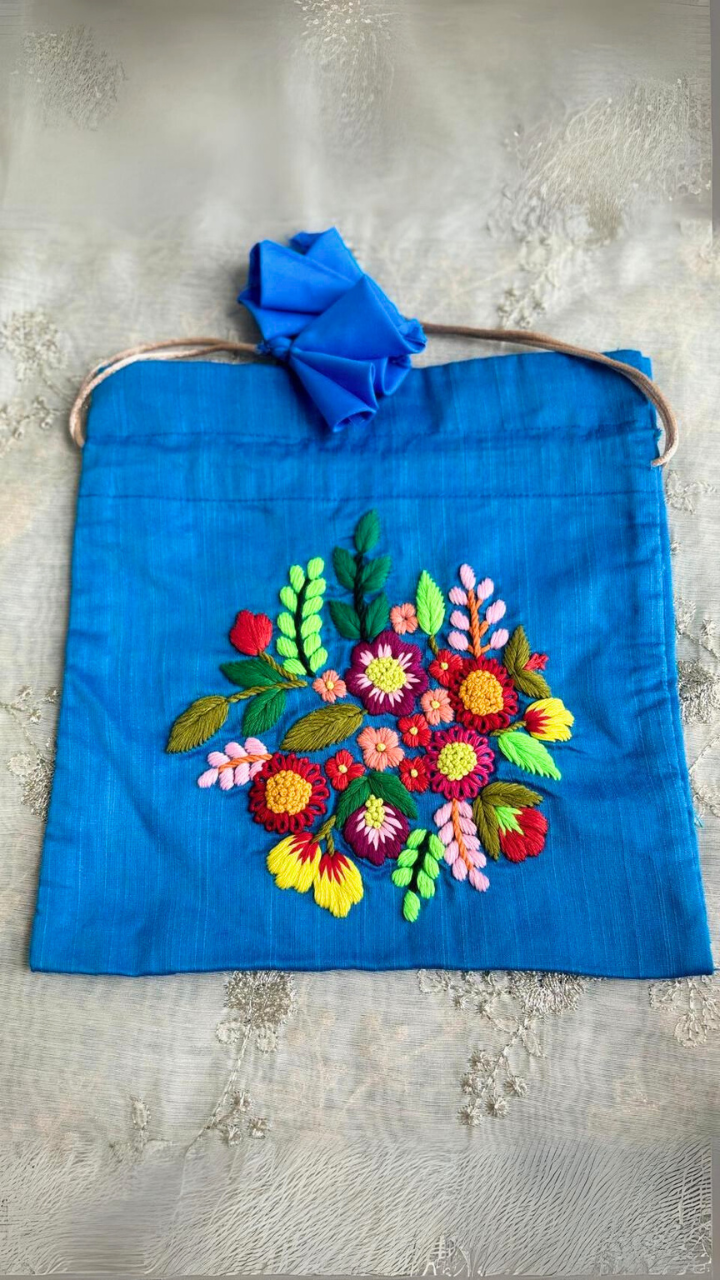 Neelam Blue Silk Potli Bag with exquisite embroidery, perfect for elegant occasions - Drape In A Minute Sarees