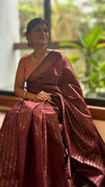 Regal Maroon Aura Kanjivaram Saree with rich fabric and intricate patterns for a regal appearance - Drape In A Minute Sarees